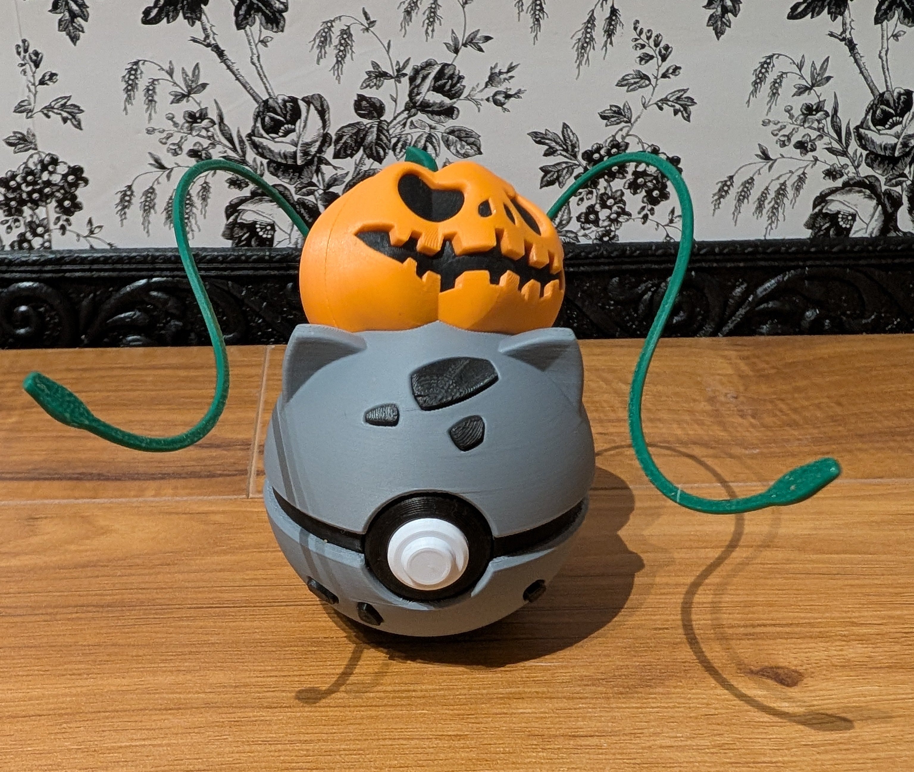 Halloween Varient Bulbasaur with a Jack-O-Latern back and grey and black Body