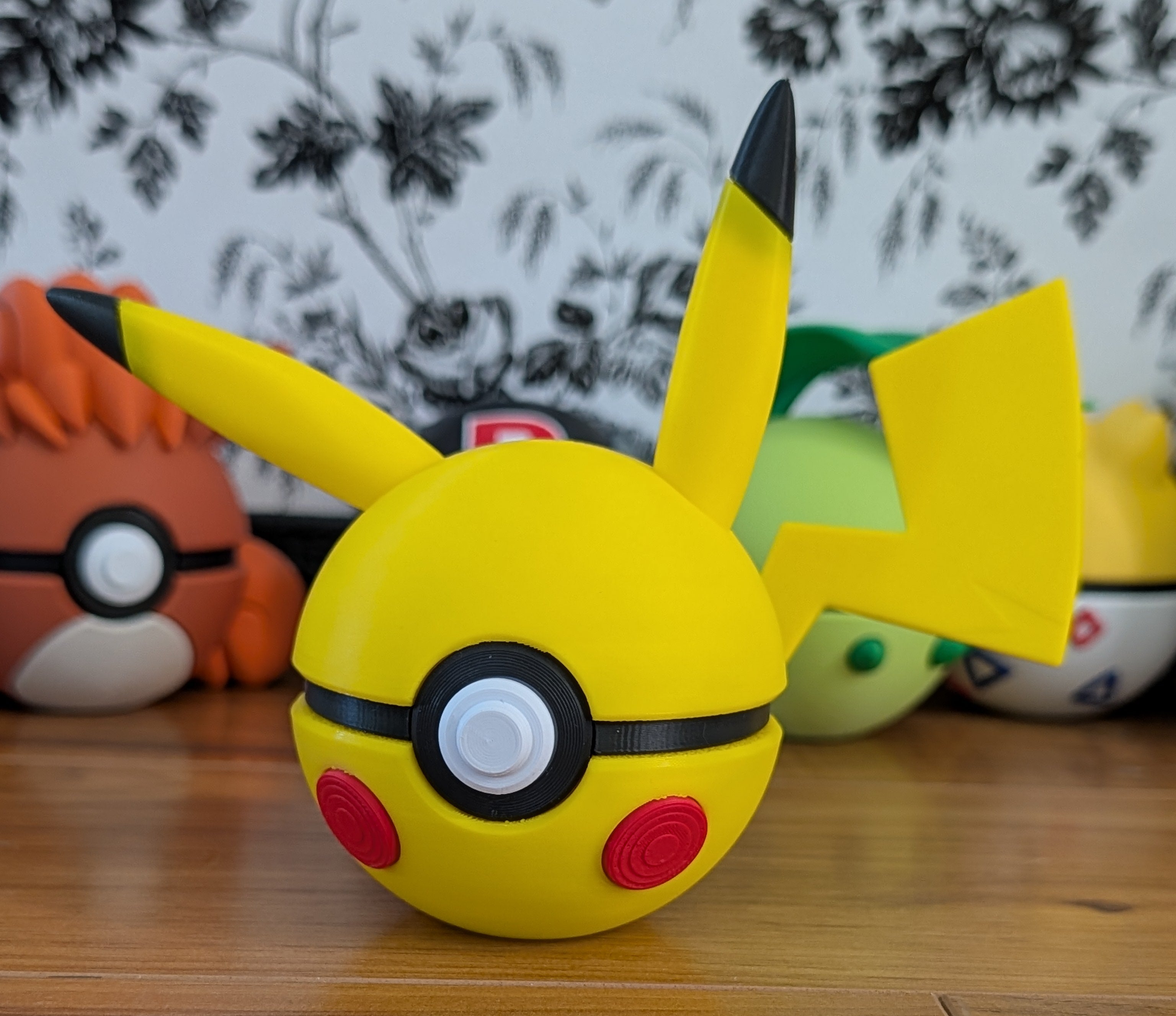 Yellow Pikachu toy with black and red accents
