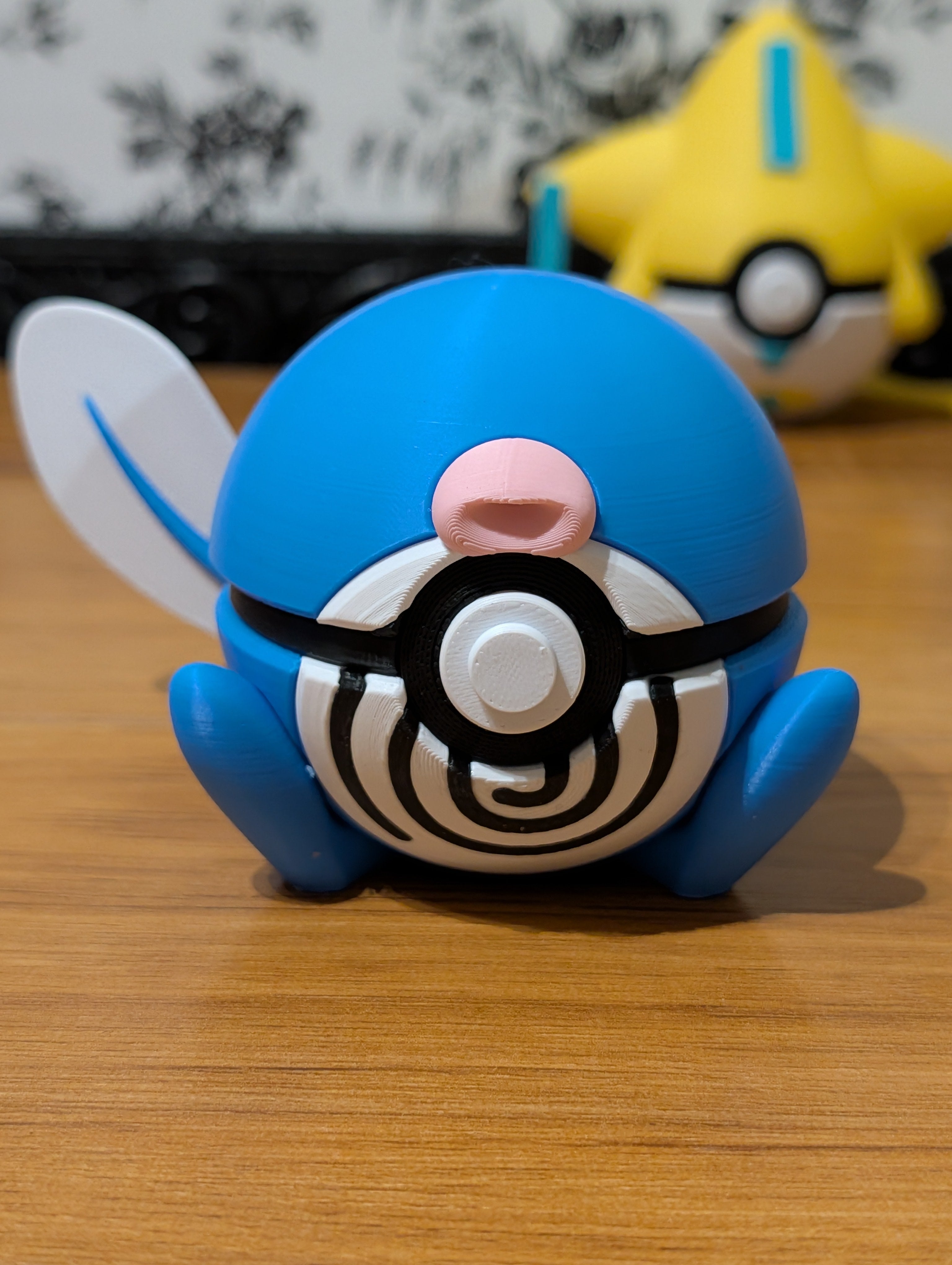 Blue character with a spiral belly